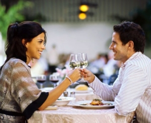 Couple toasting atdinner